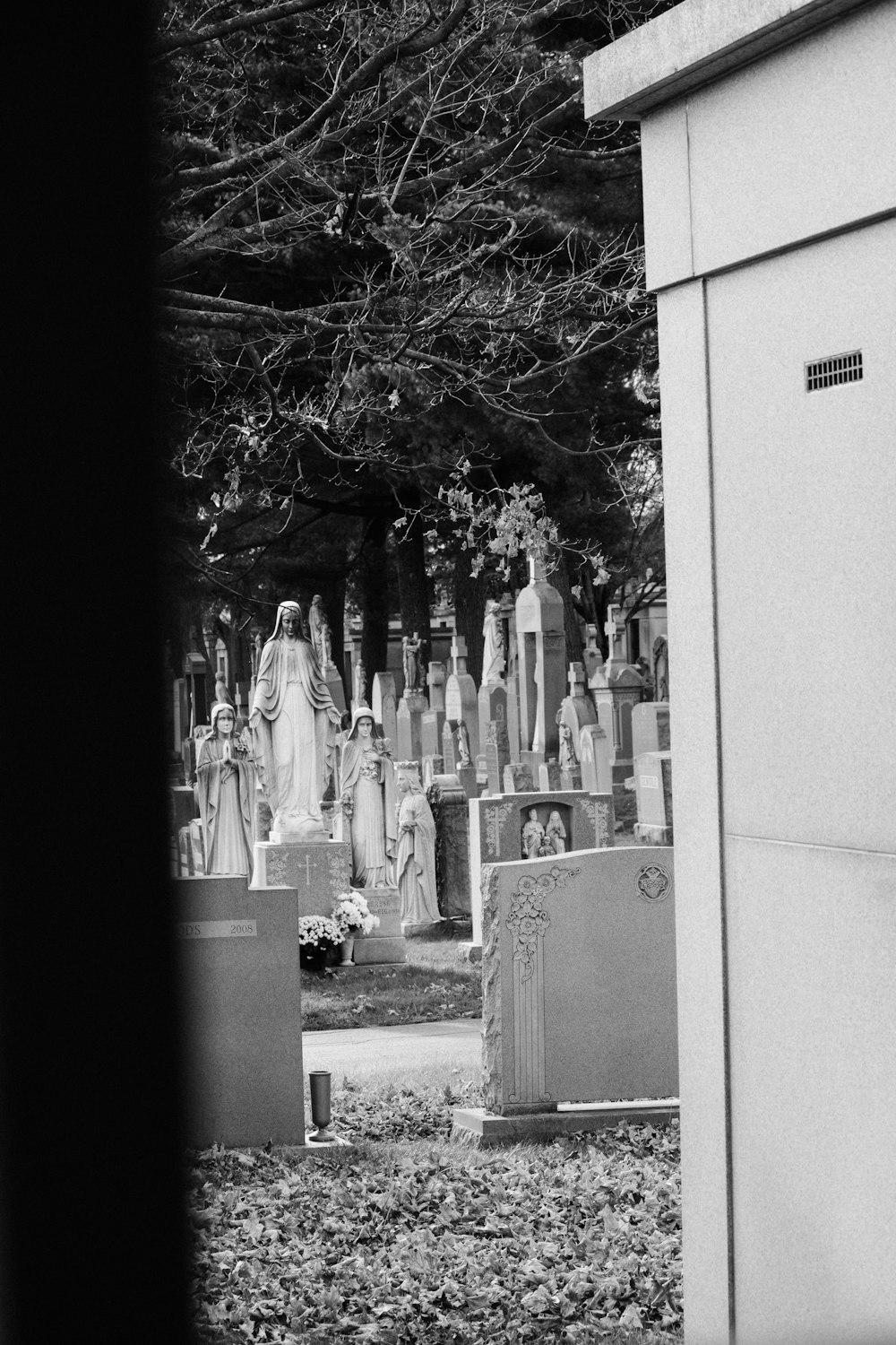 a cemetery with a statue