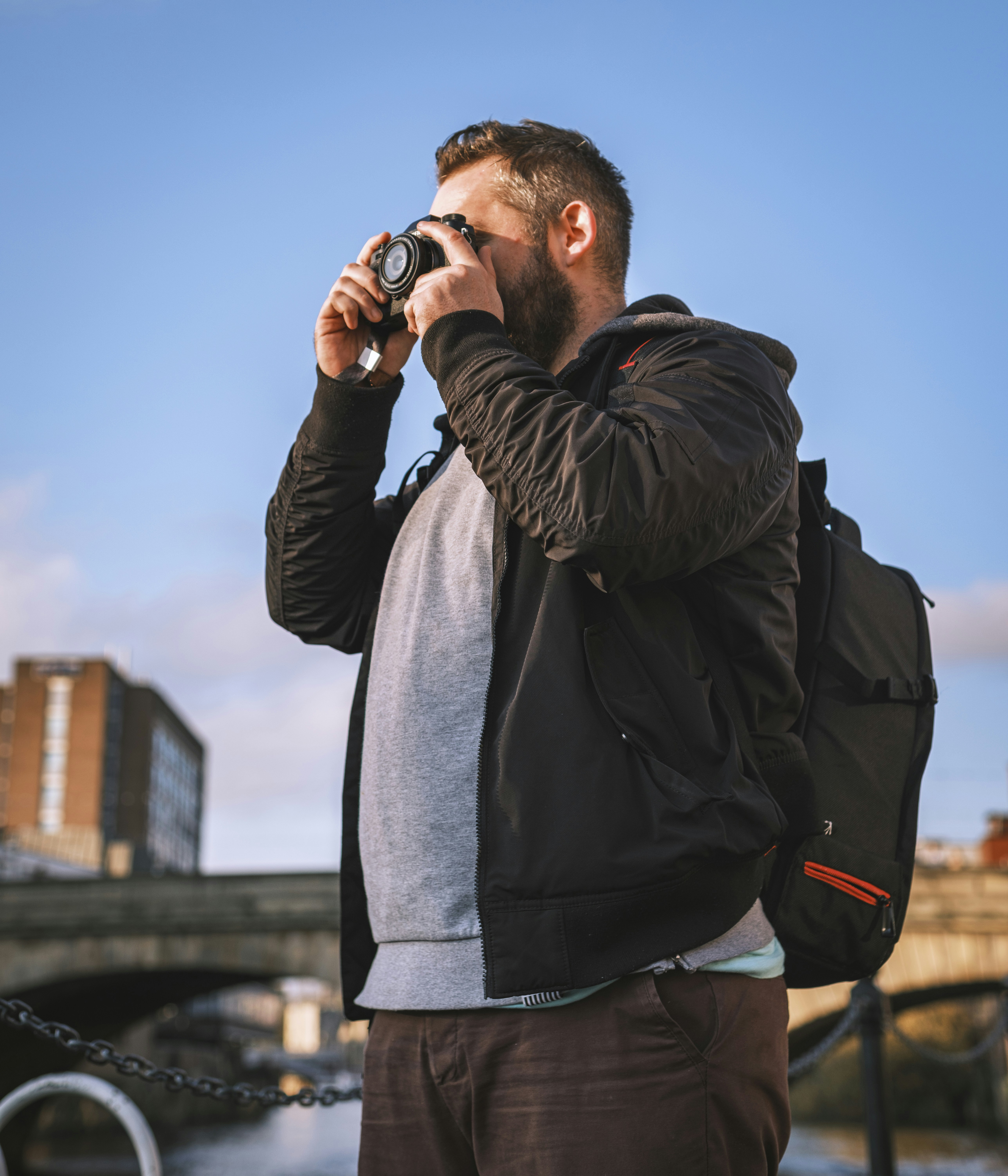 a person taking a picture with a camera