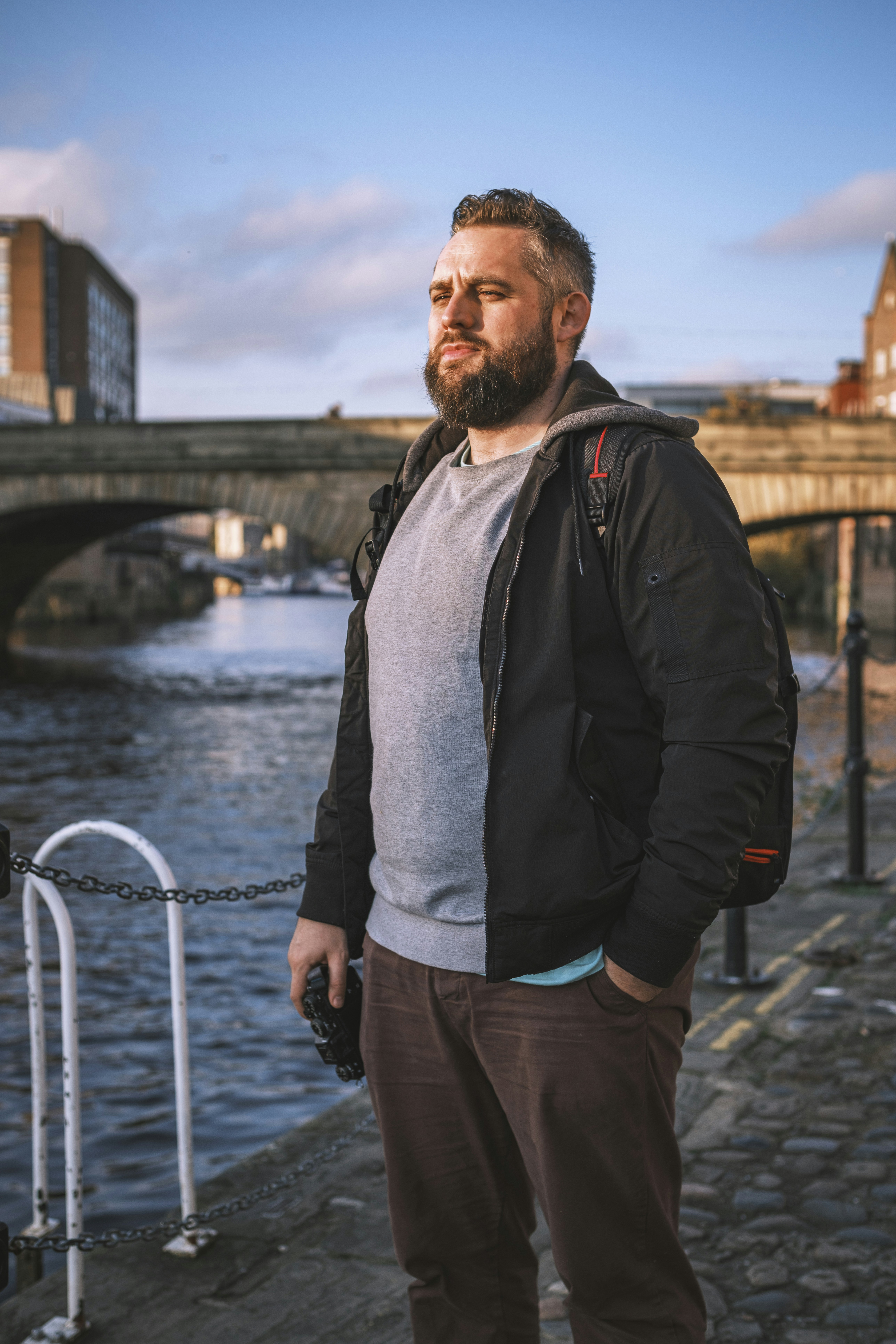 a man standing on a bridge