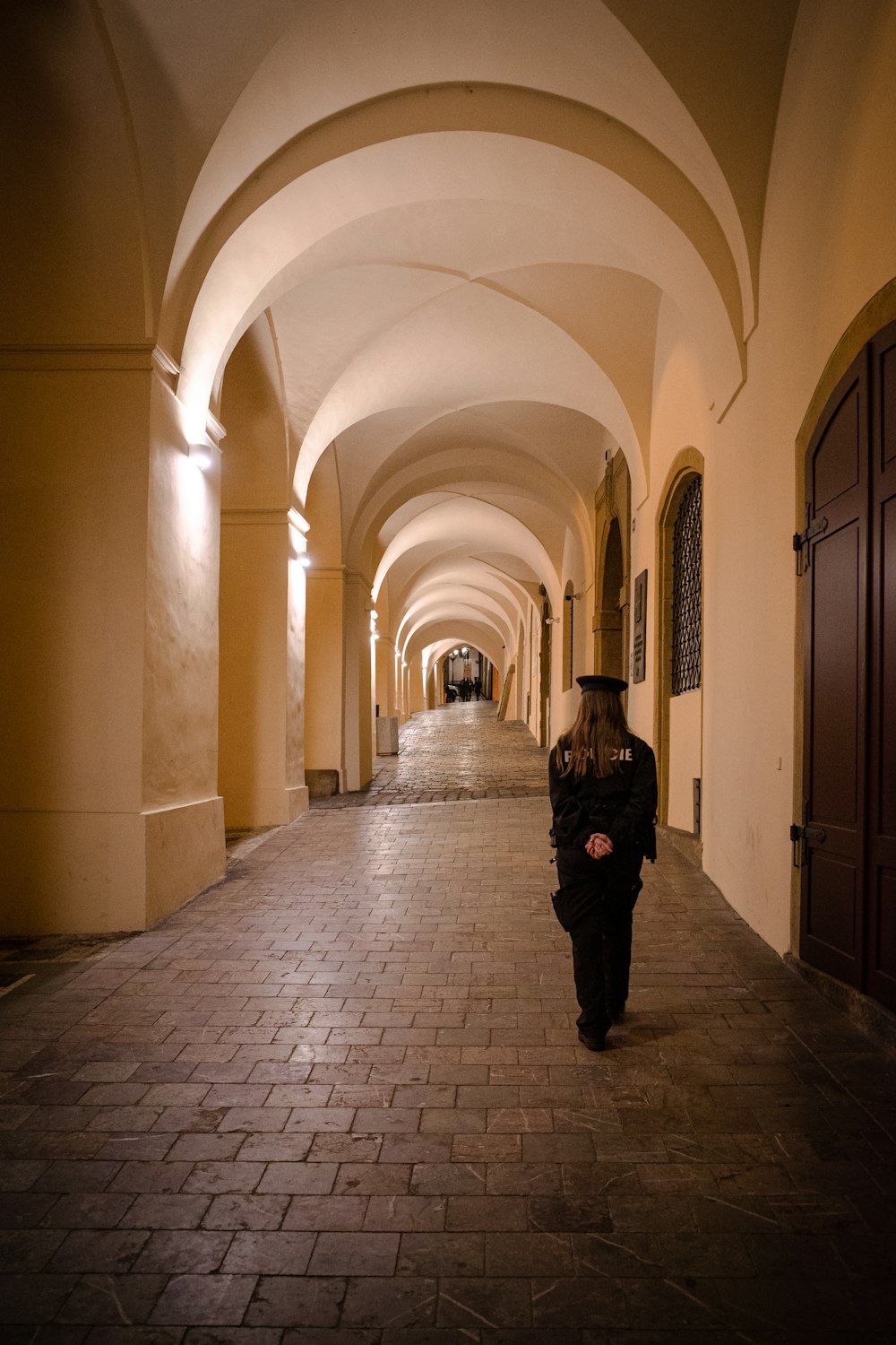 a person walking through a hallway