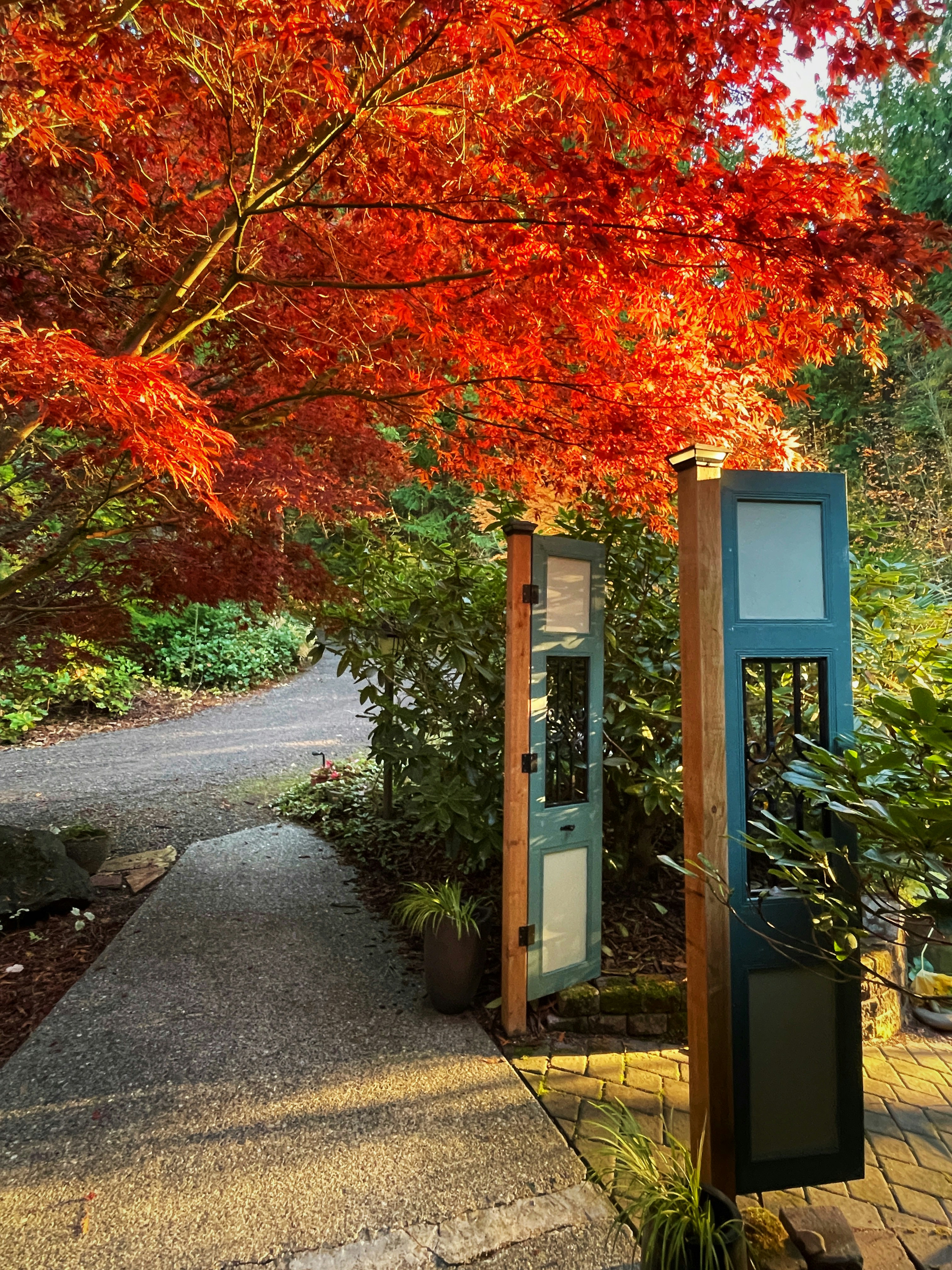 a telephone booth on a sidewalk