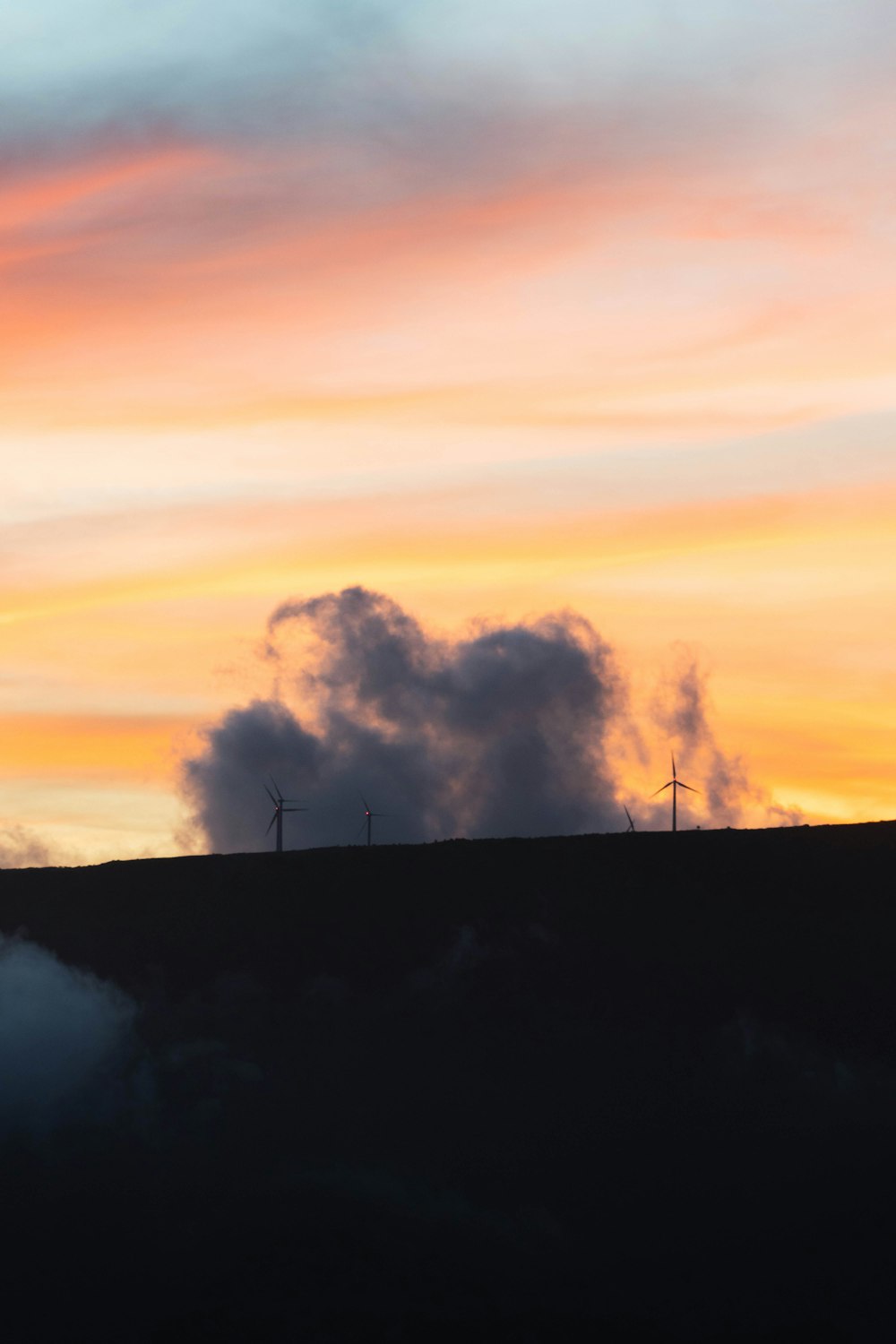 a group of wind turbines