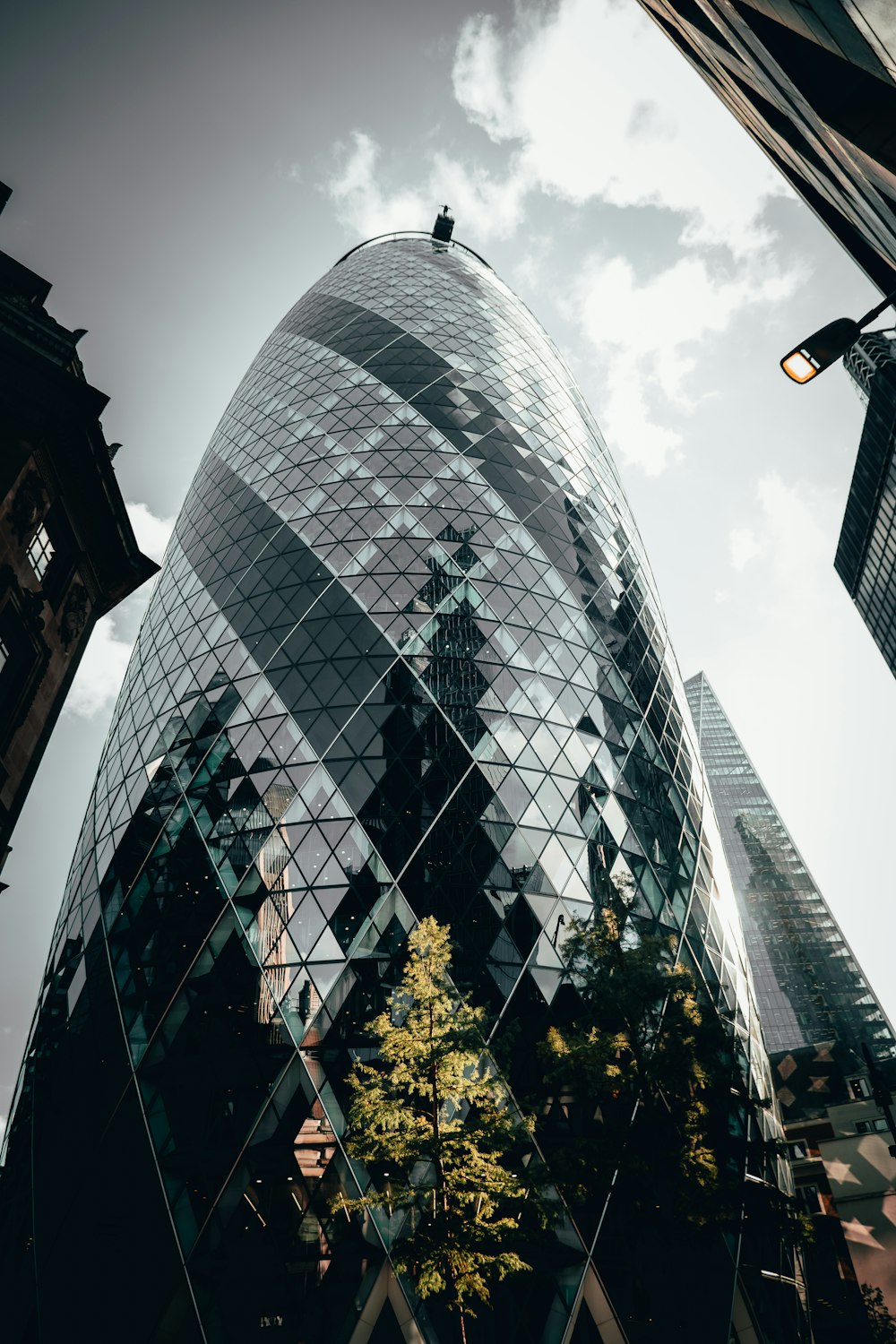 a tall glass building with 30 St Mary Axe in the background