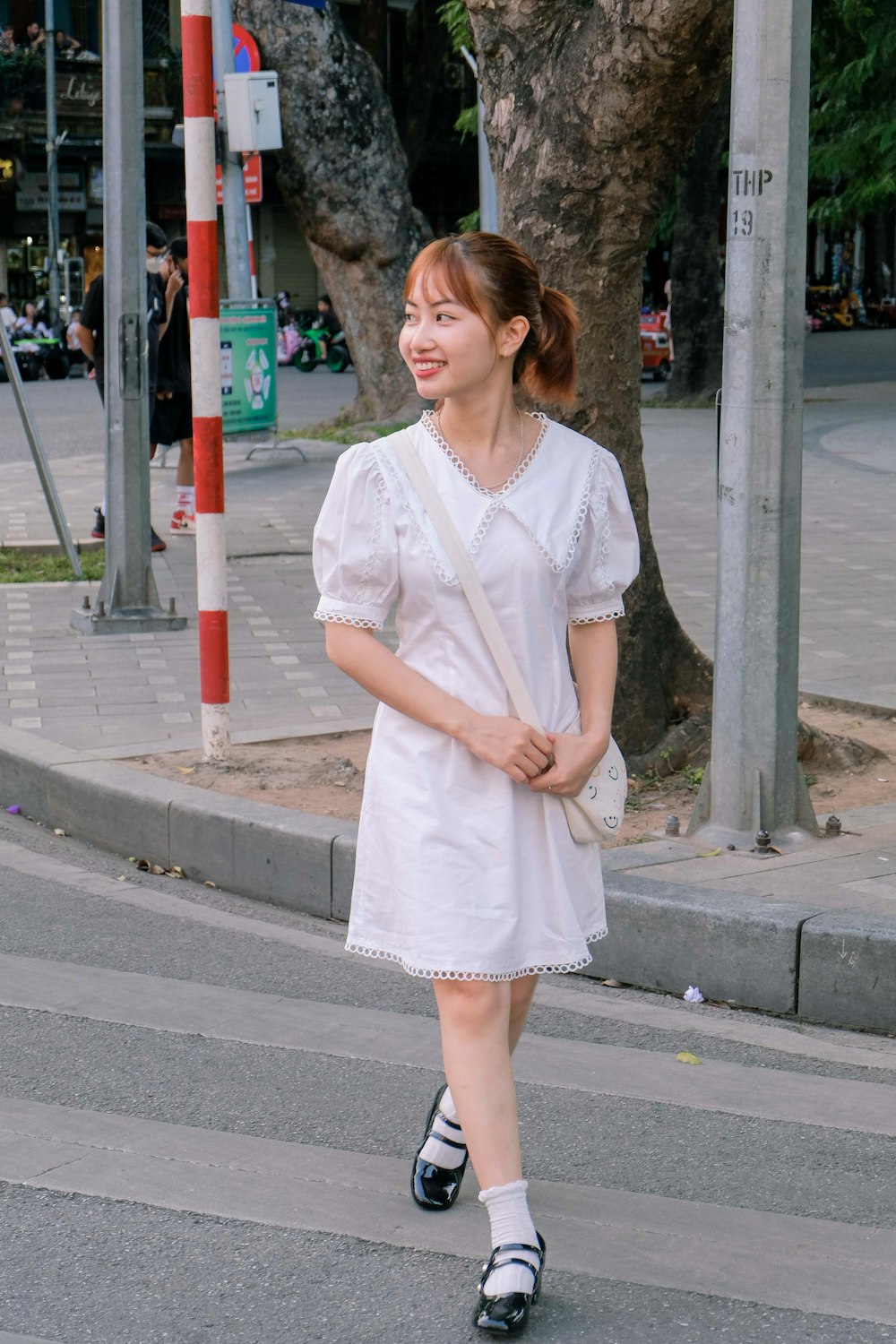 a woman in a white dress