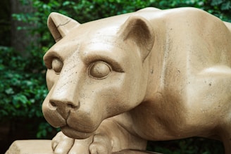 a statue of a penn state nittany lion