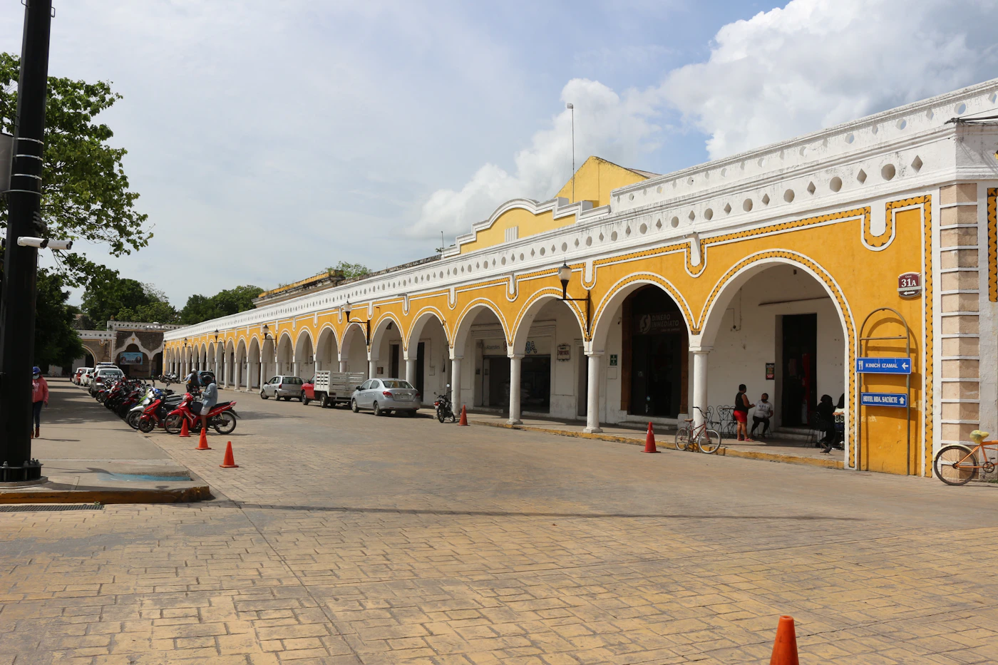 The arched vaulted architecture Las Bovedas in Izamal Yucatan Mexico with the characteristic yellow stone construction of the colonial buildings