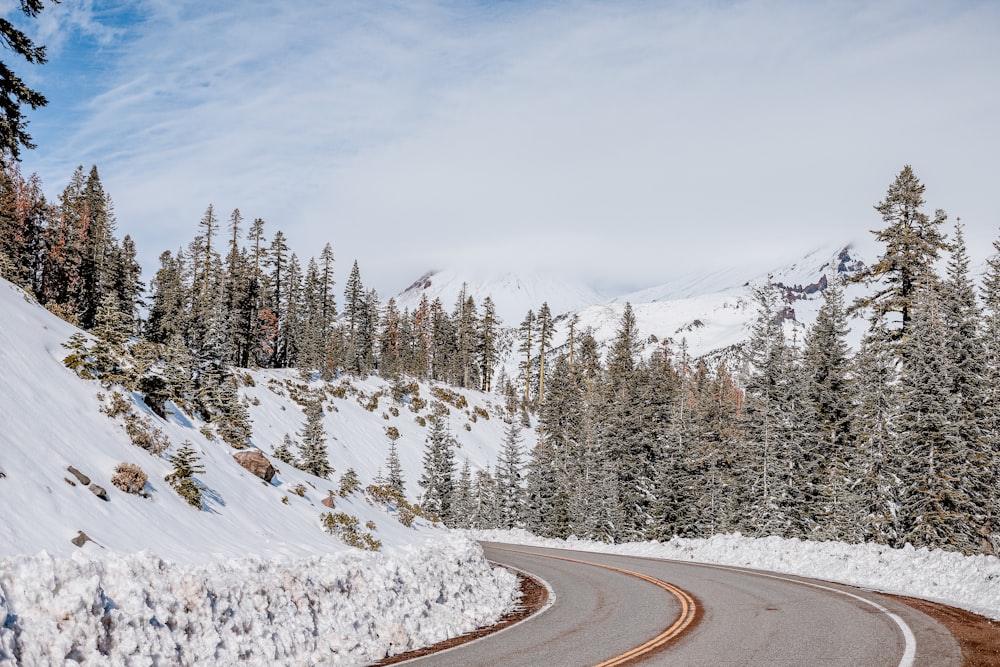 a road with snow on the side