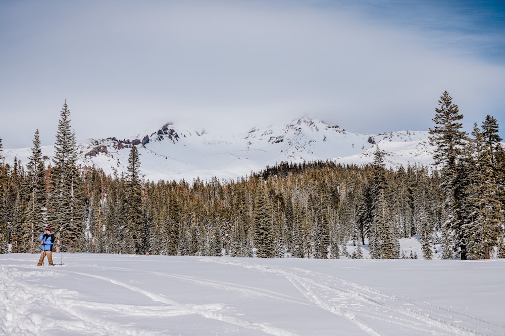 a person skiing on the snow