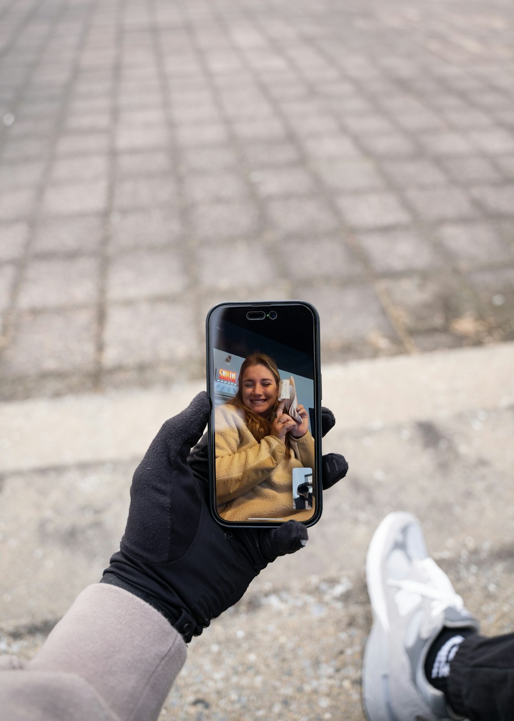 a person taking a picture of herself in a mirror