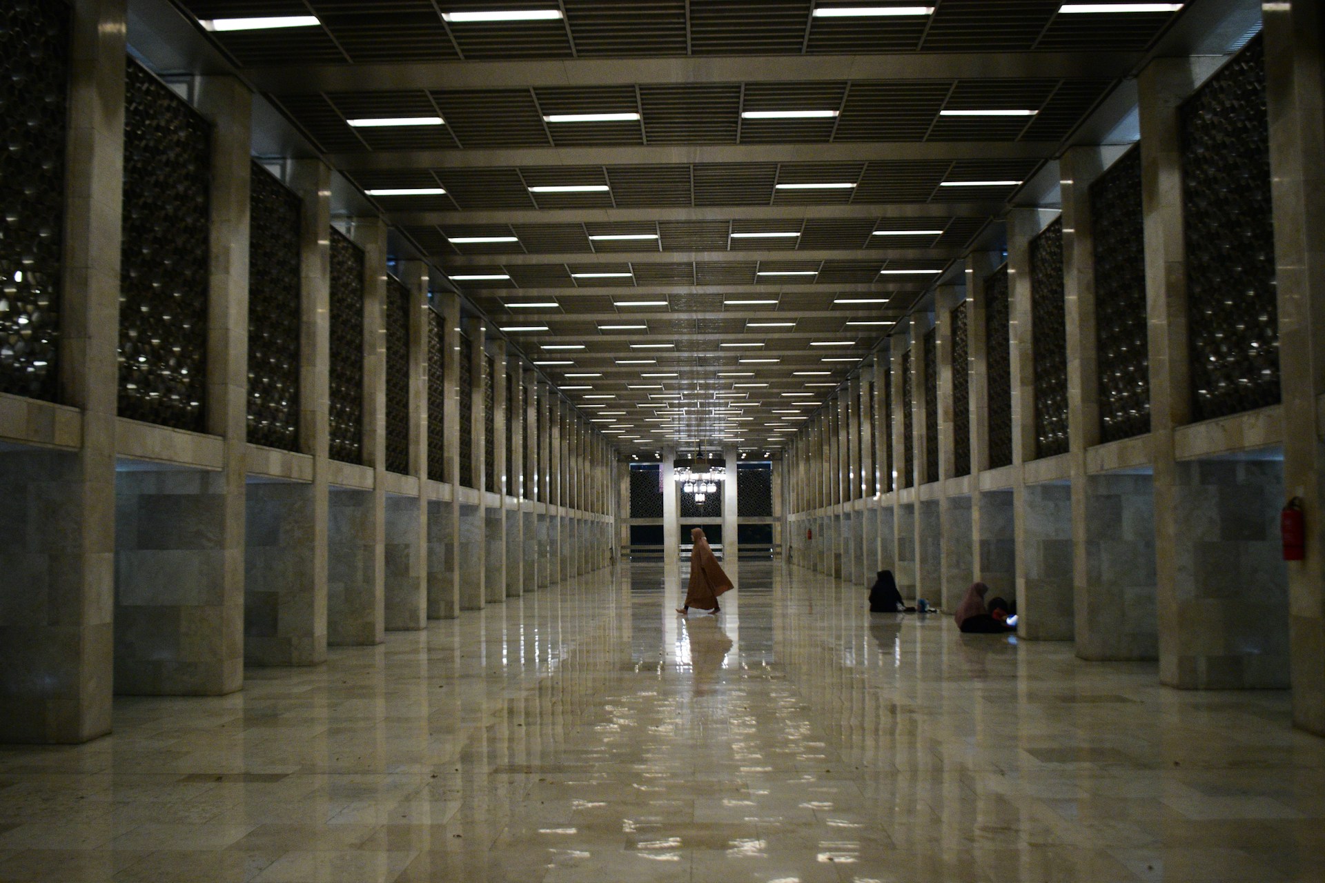 a person walking in a large building
