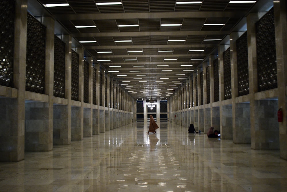 a person walking in a large building