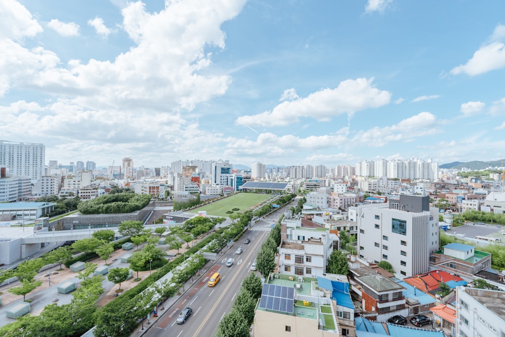 a city with a road and cars