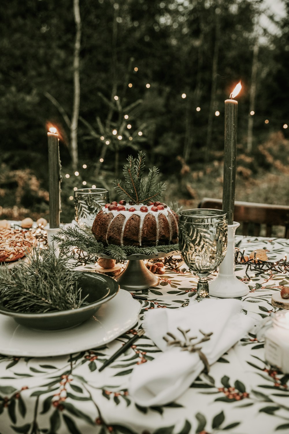 a table with a cake and candles