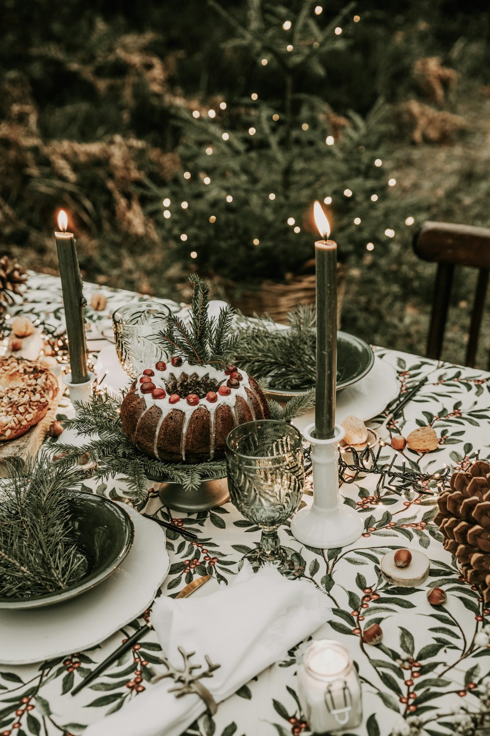 a table with candles and food on it