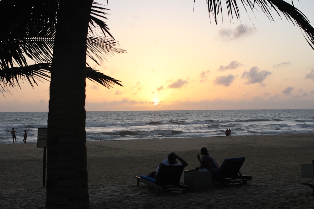 people sitting on a beach