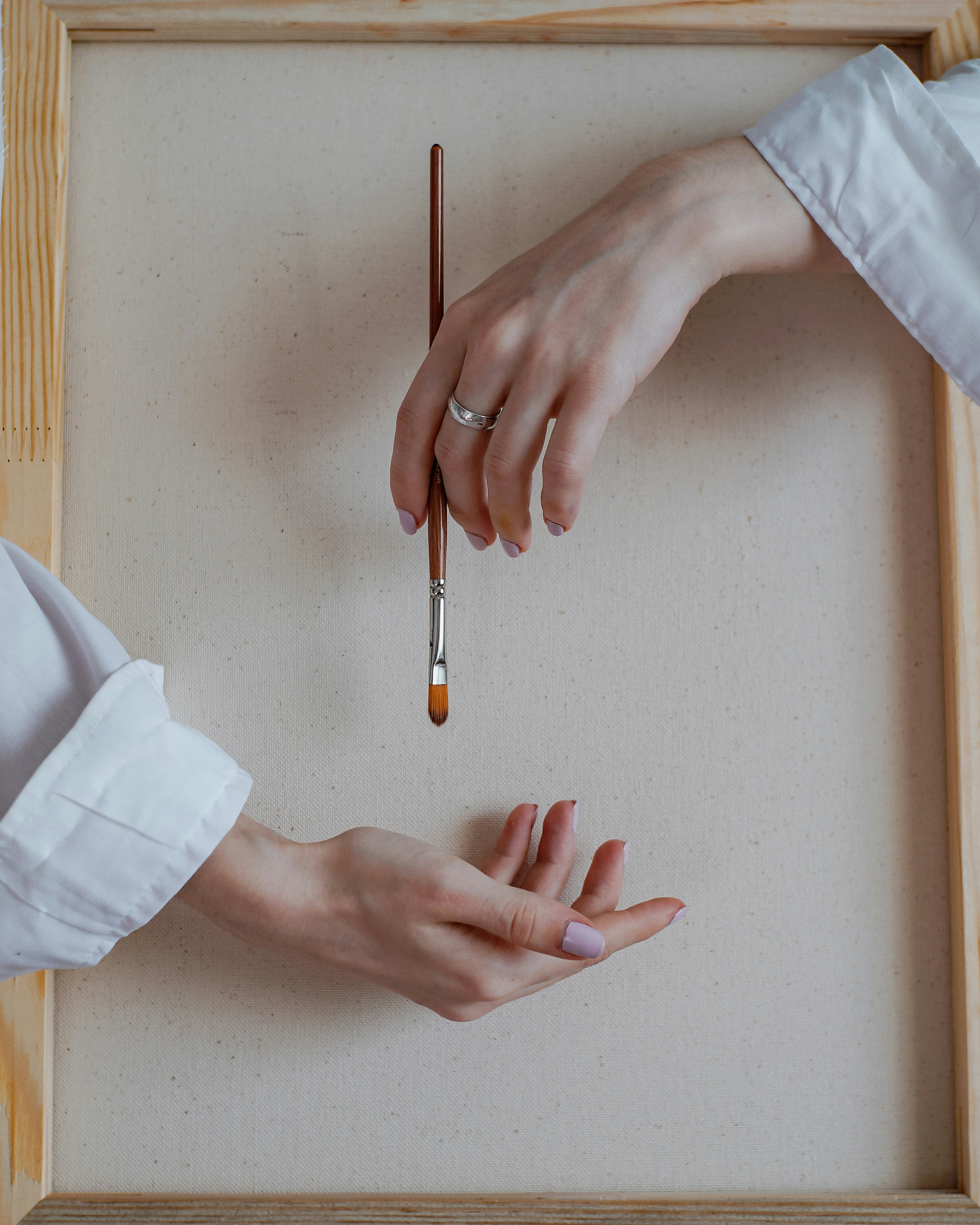 a person drawing on a white board
