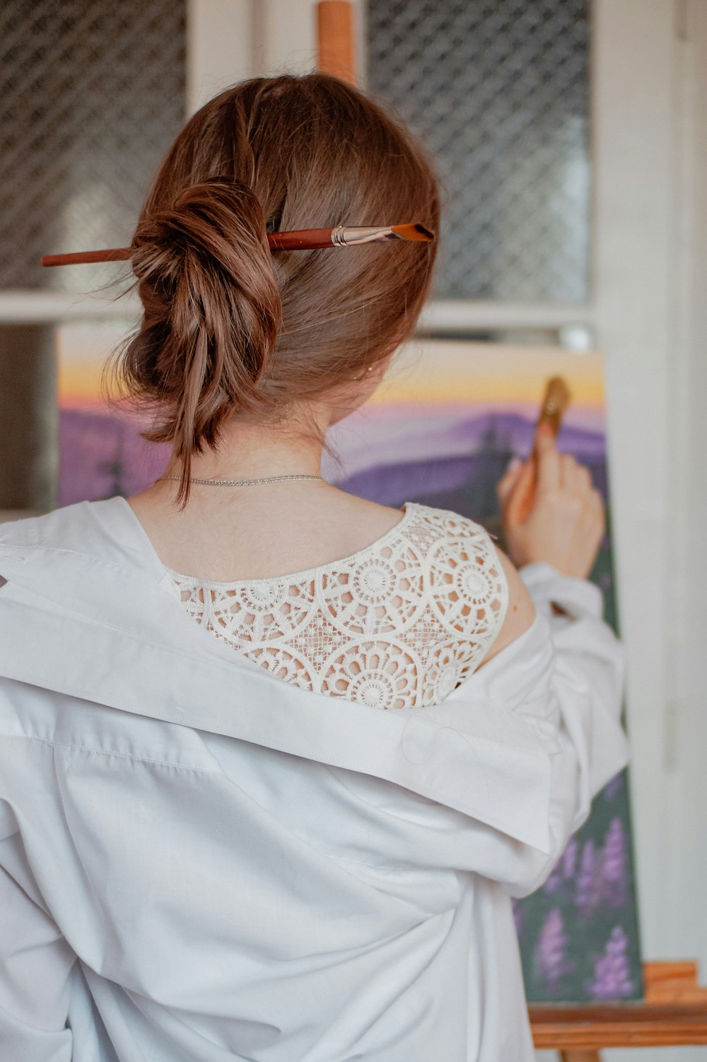 a woman with a ponytail