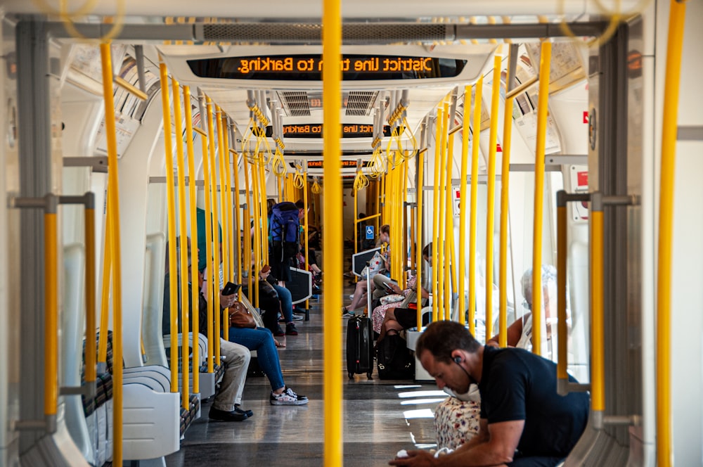 people sitting in a train station