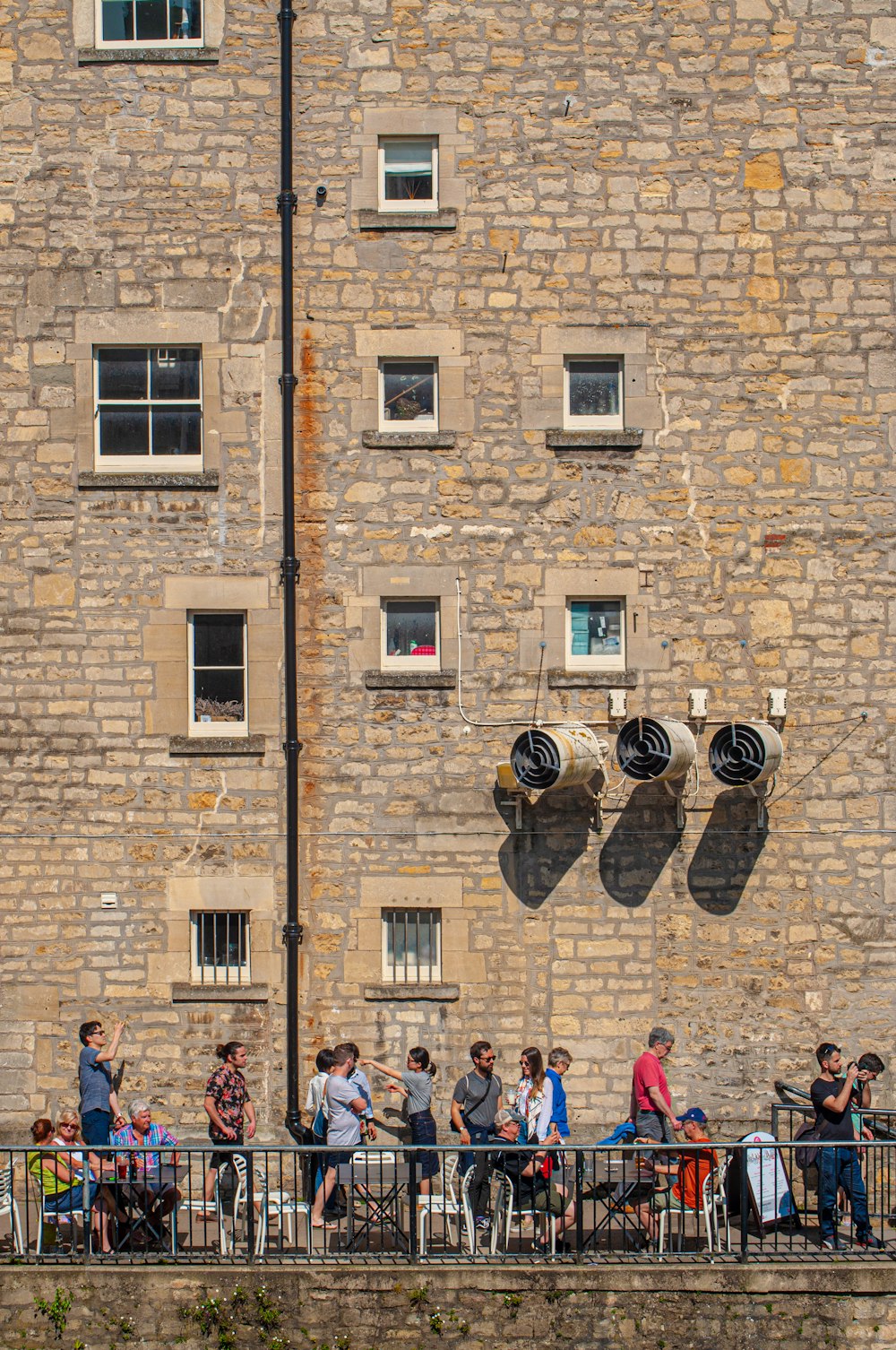 a group of people standing outside a building