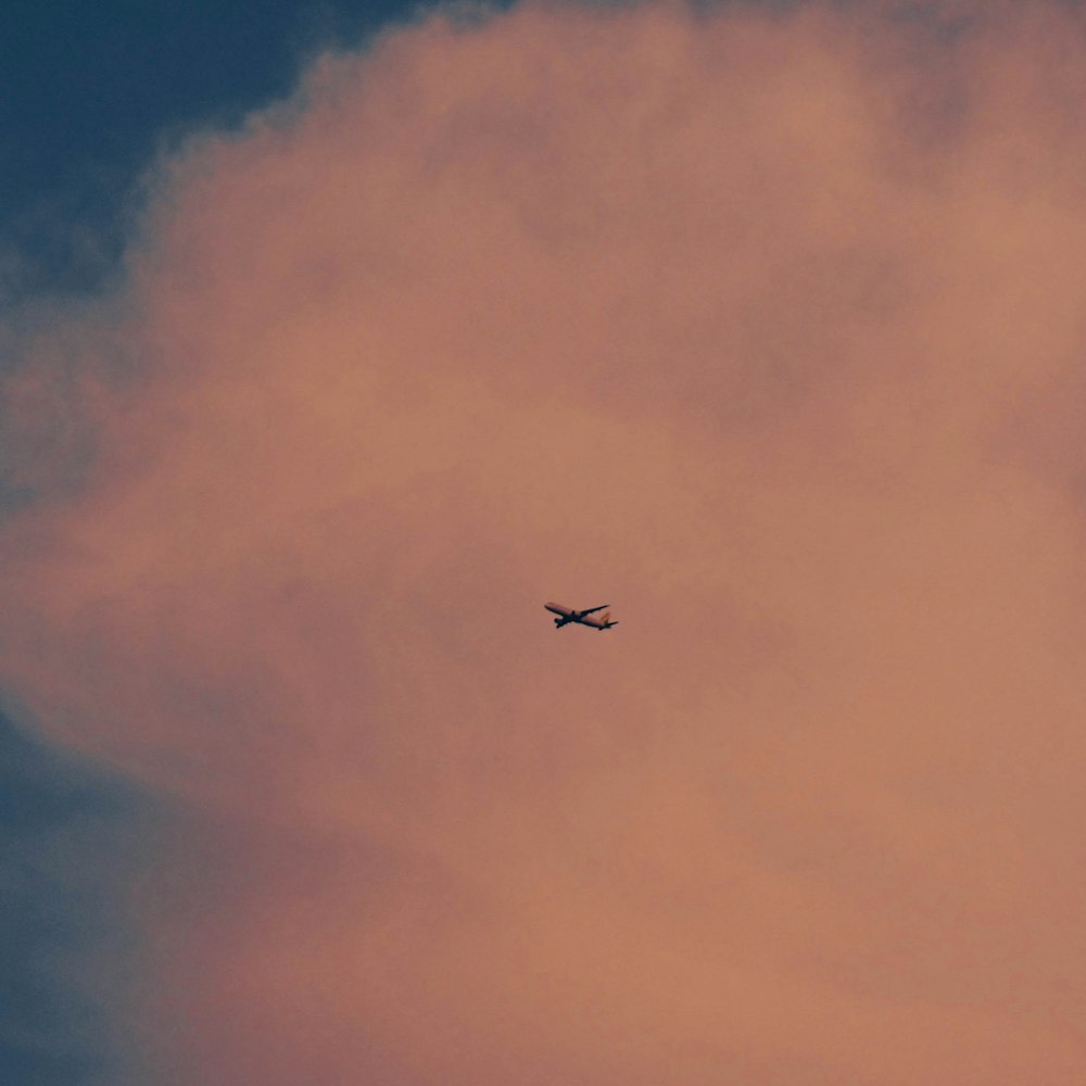 a plane flying in the sky