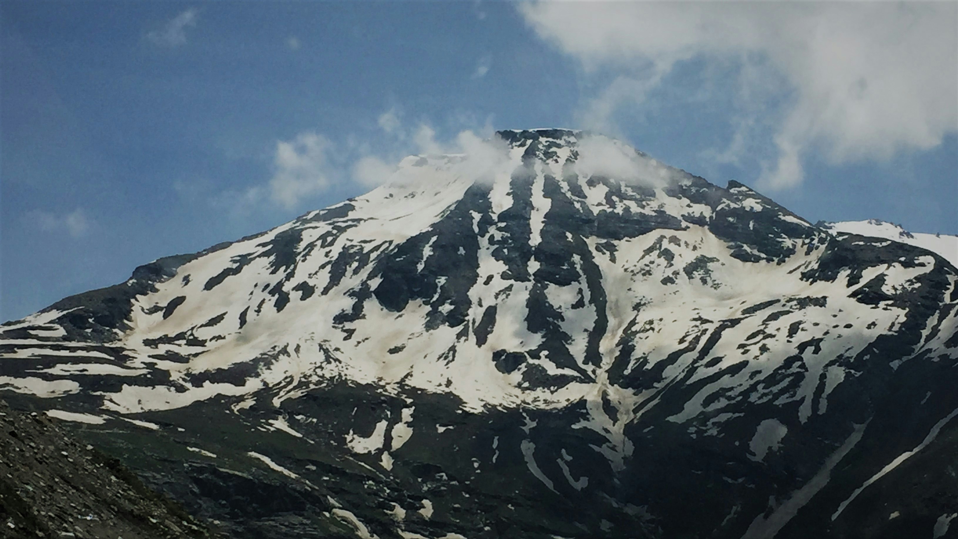 a mountain with snow