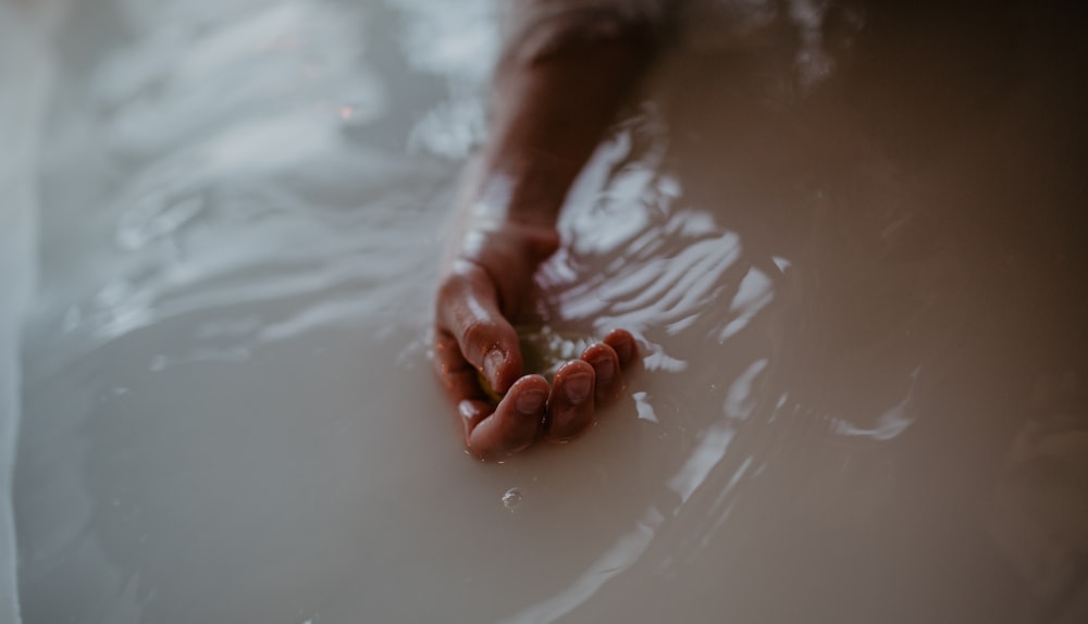 a person's feet in water
