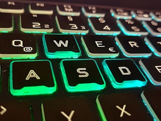 A typing exercise screen showing bottom row keys highlighted.