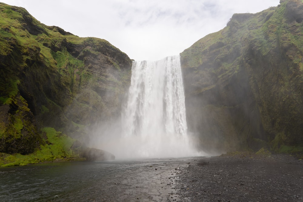 a waterfall over a cliff