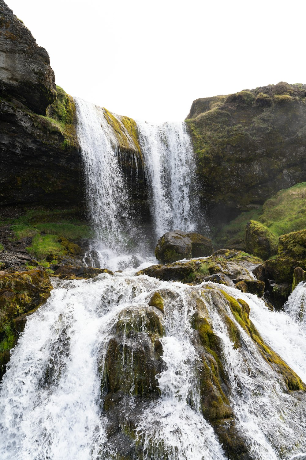 a waterfall in a rocky place