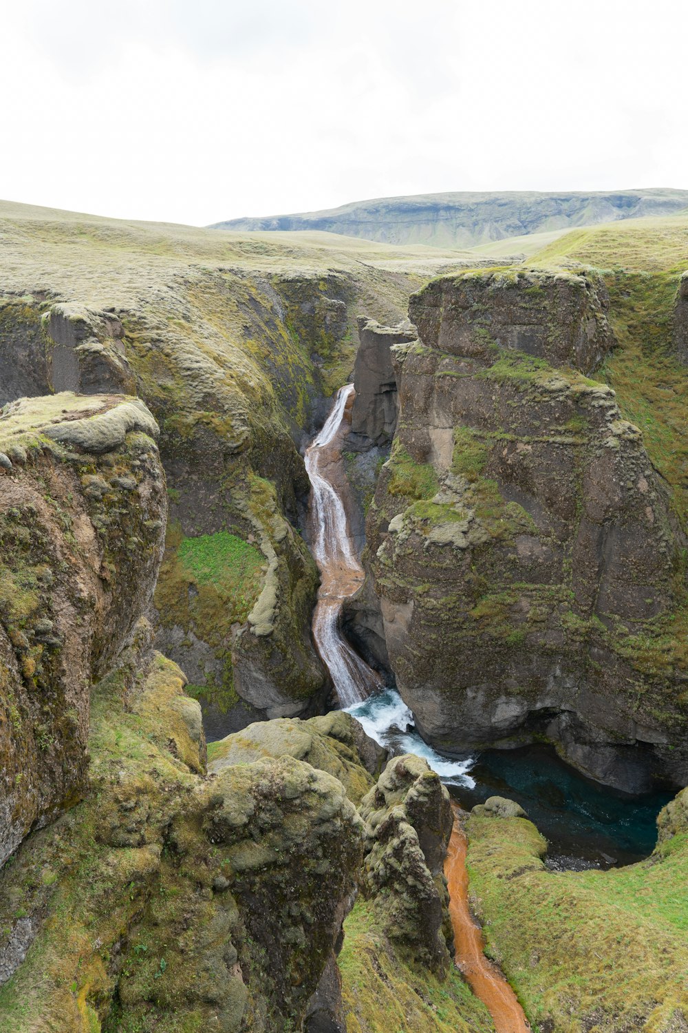 a waterfall over a cliff