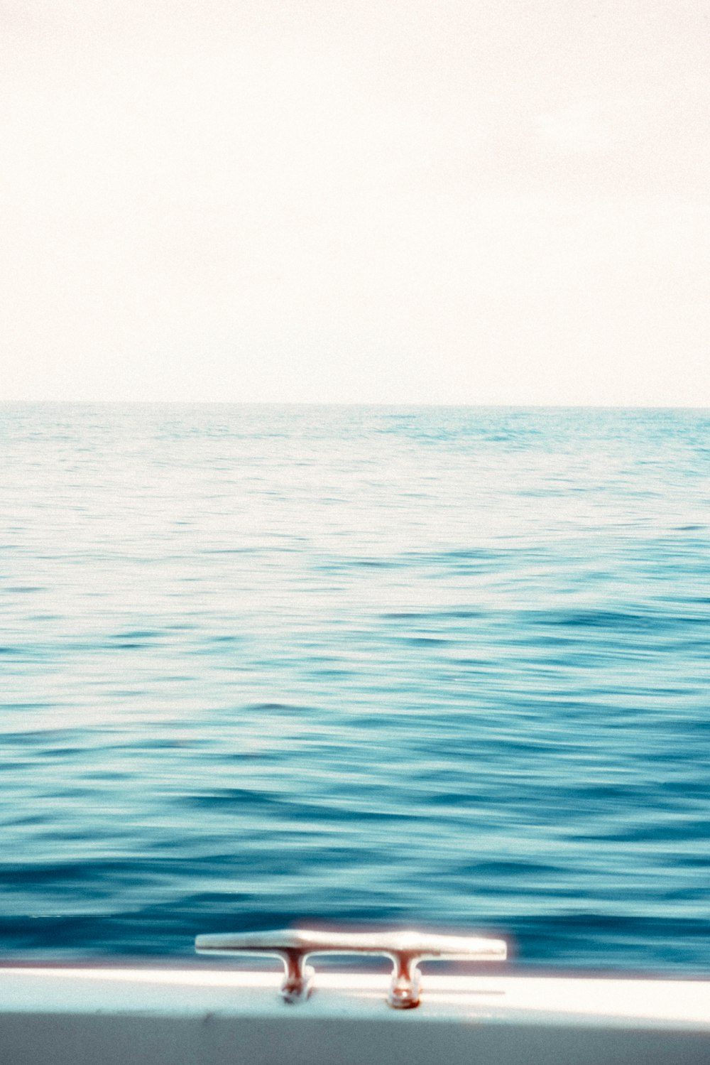 a plane flying over the ocean