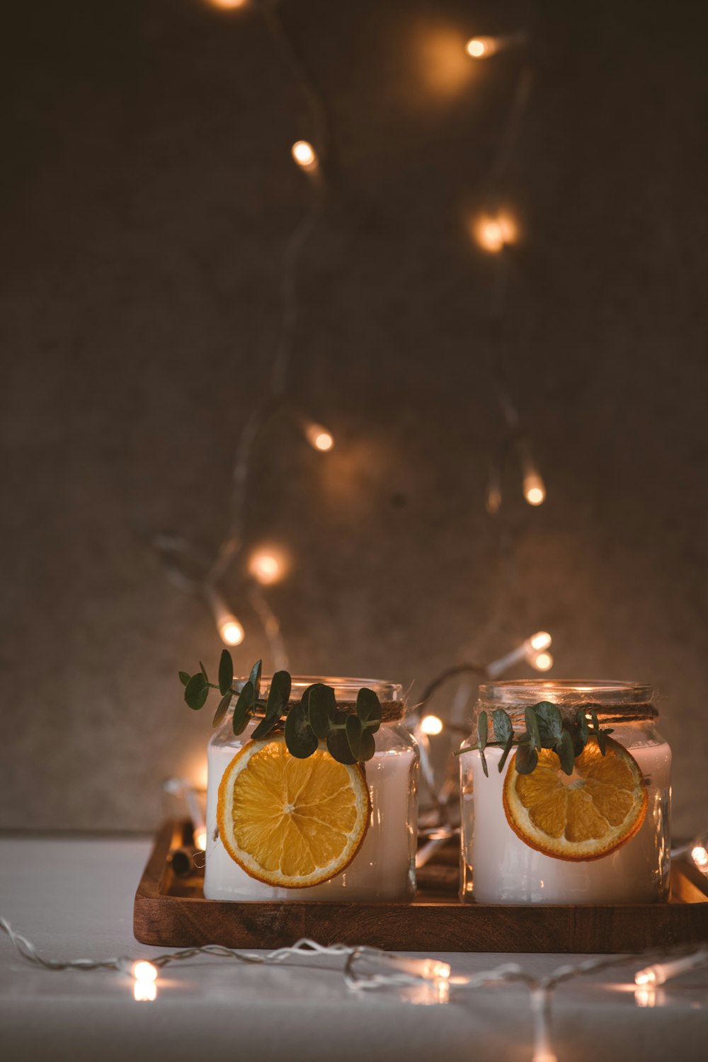 a couple of carved pumpkins with candles in them