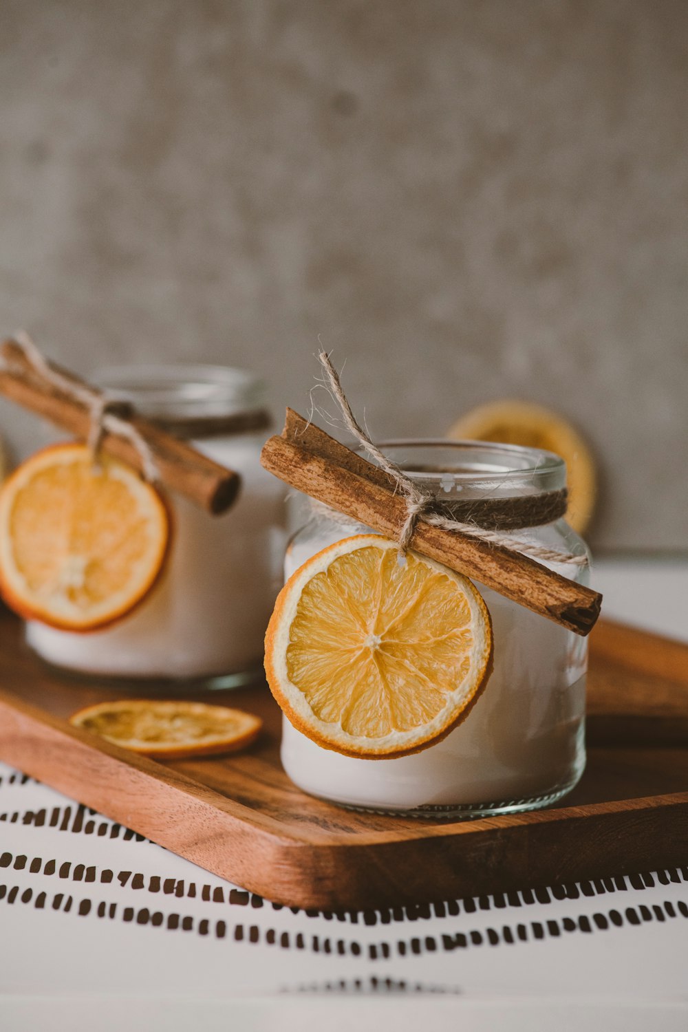 a group of oranges on a plate