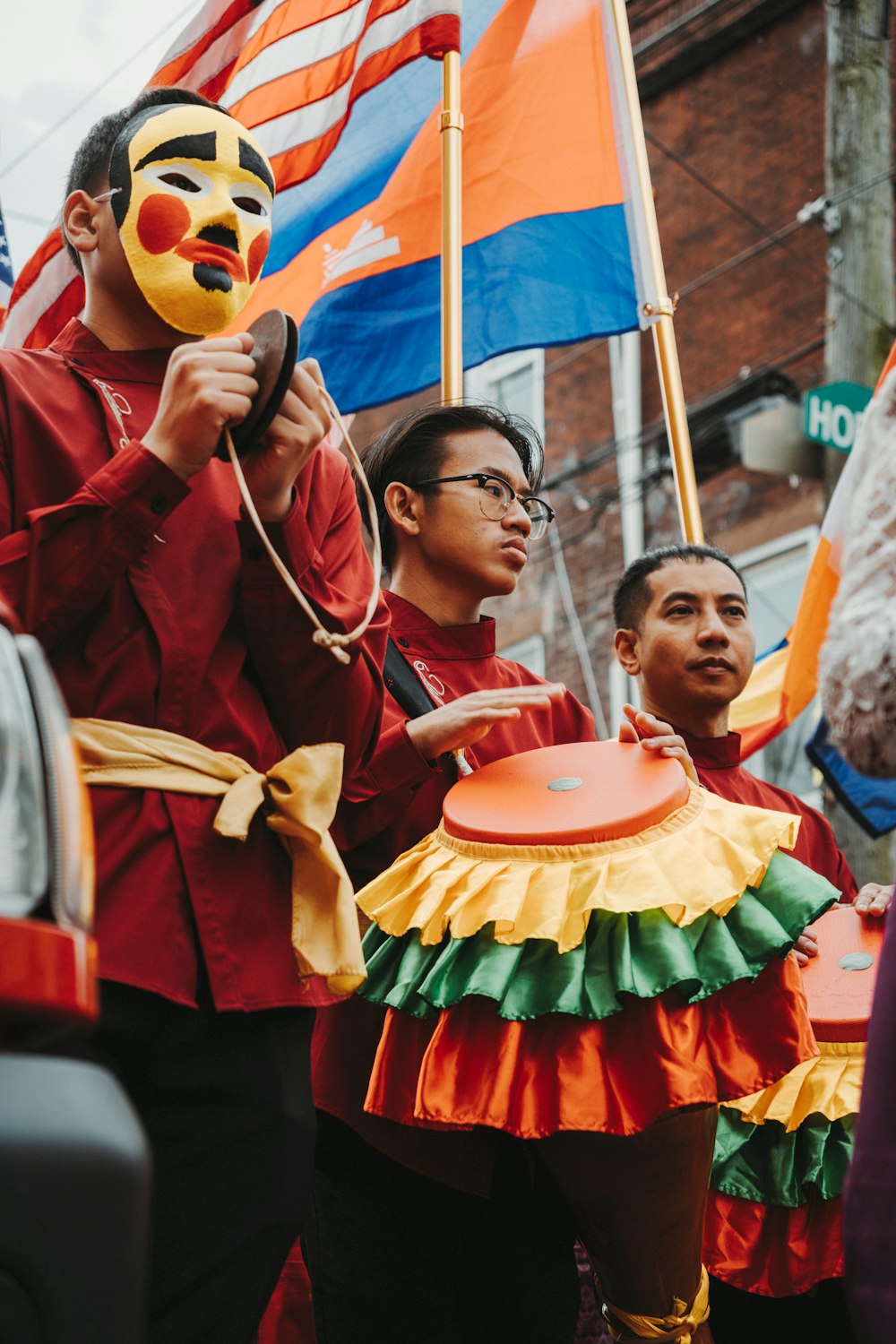 a group of people holding flags