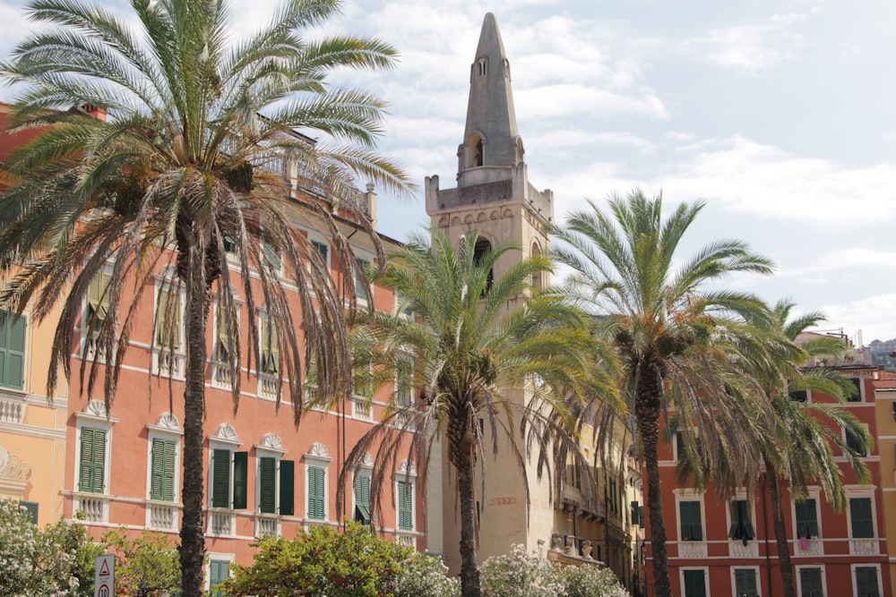 a building with palm trees in front of it