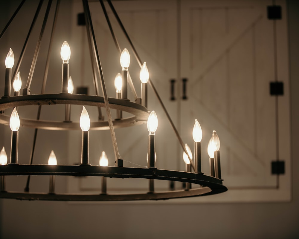 a group of candles on a shelf