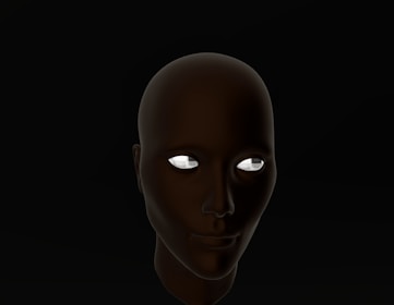 a man's face with glowing eyes