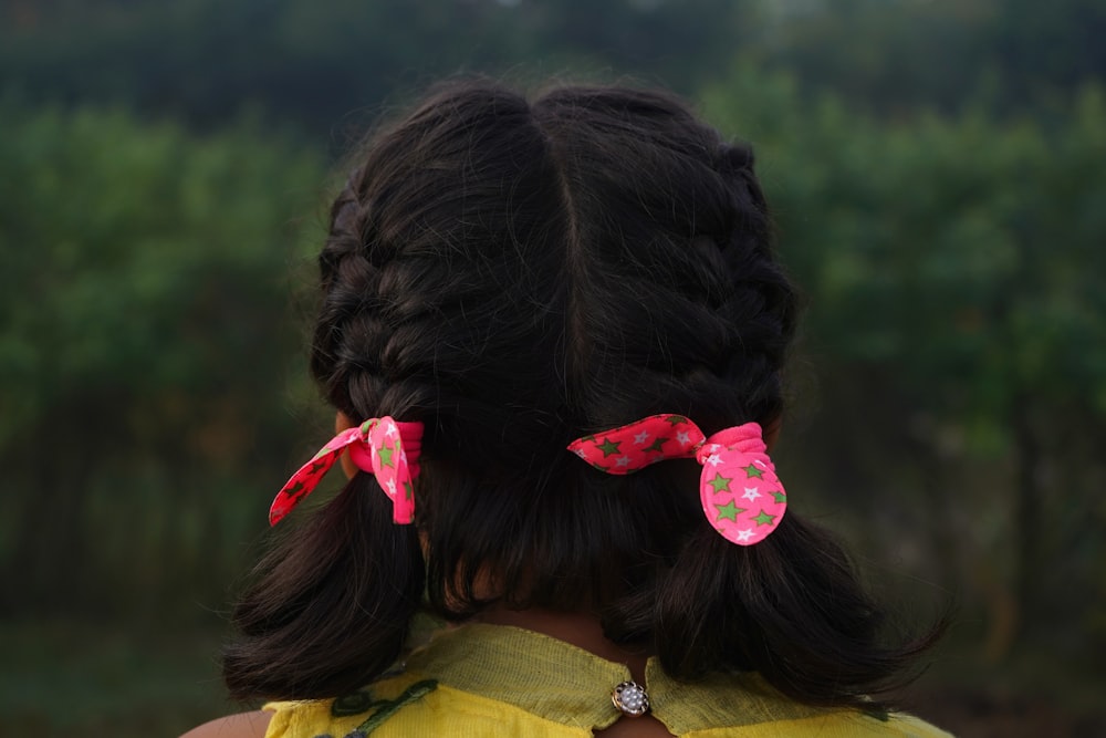 a person with a flower in the hair
