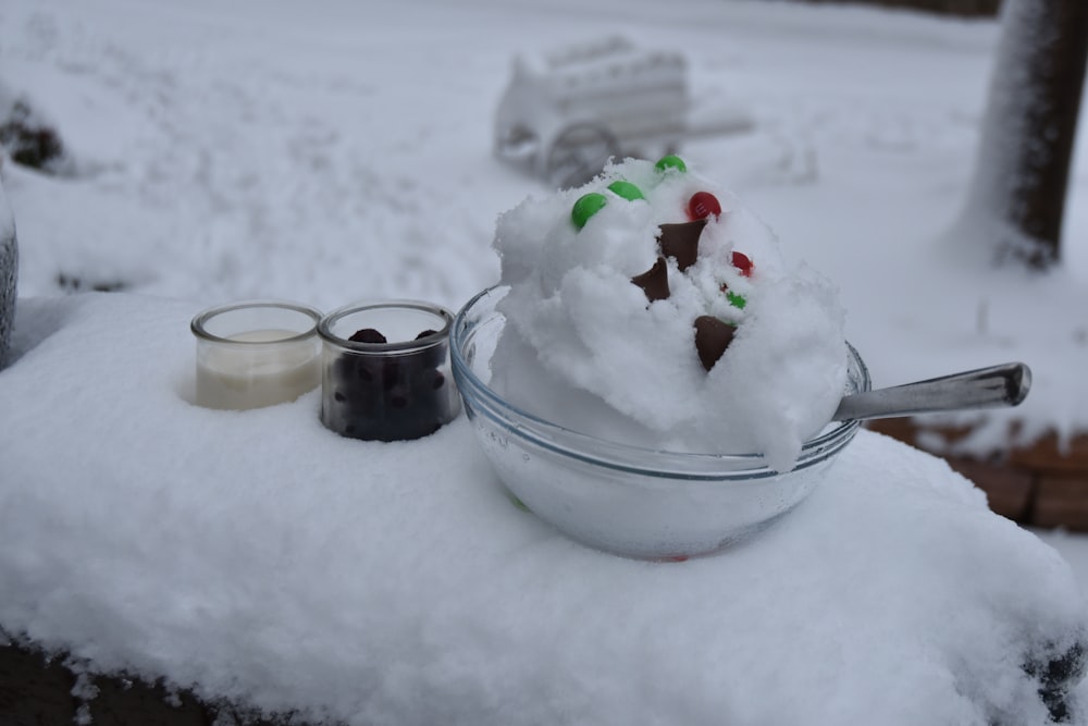 a plate of food and a fork in the snow