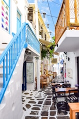 a street with tables and chairs