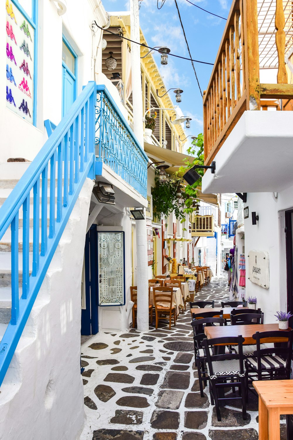 a street with tables and chairs