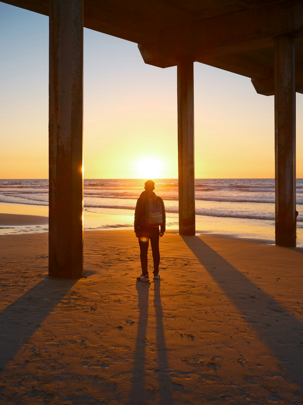 a person standing on a beach