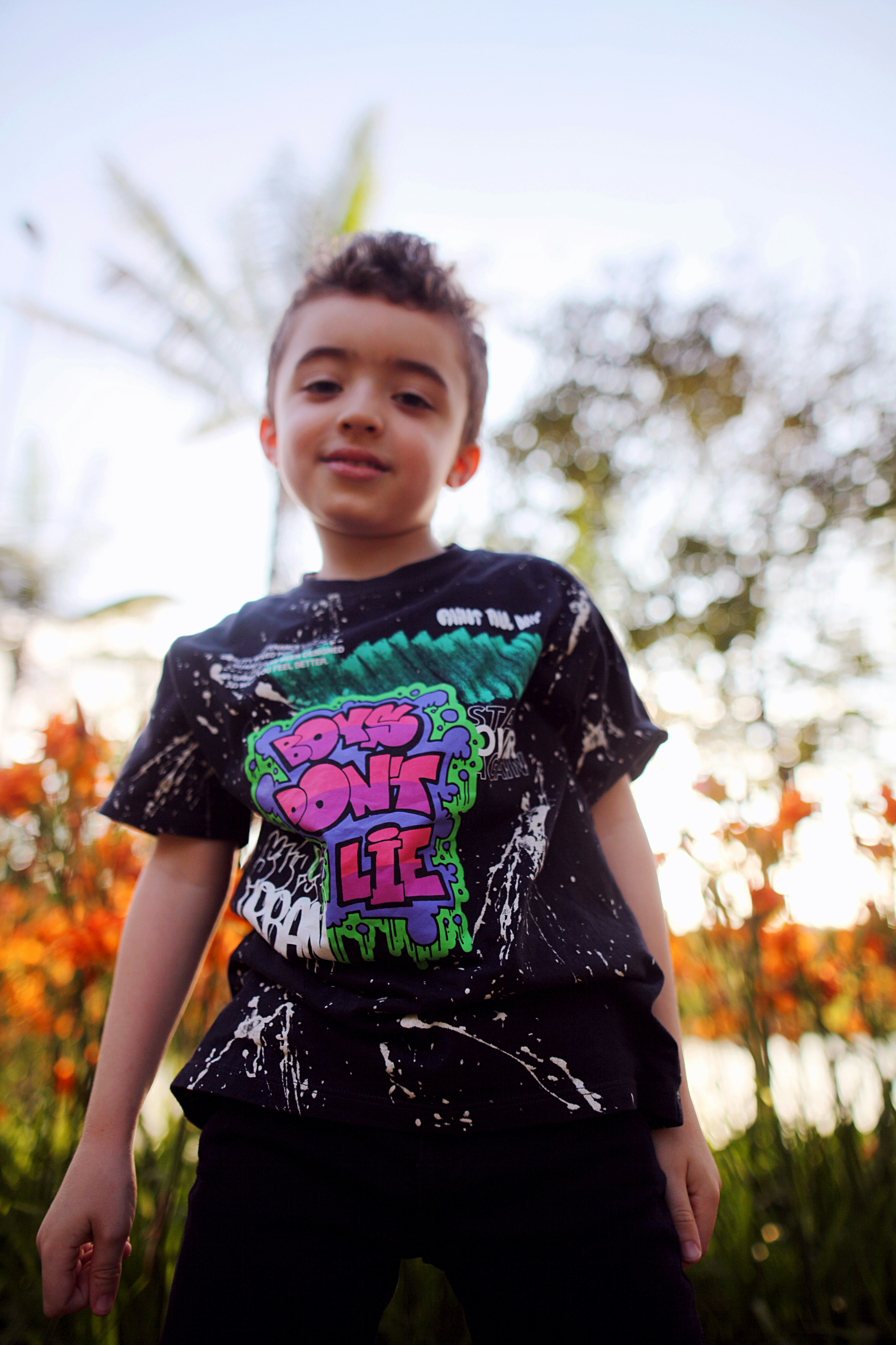 a boy standing outside