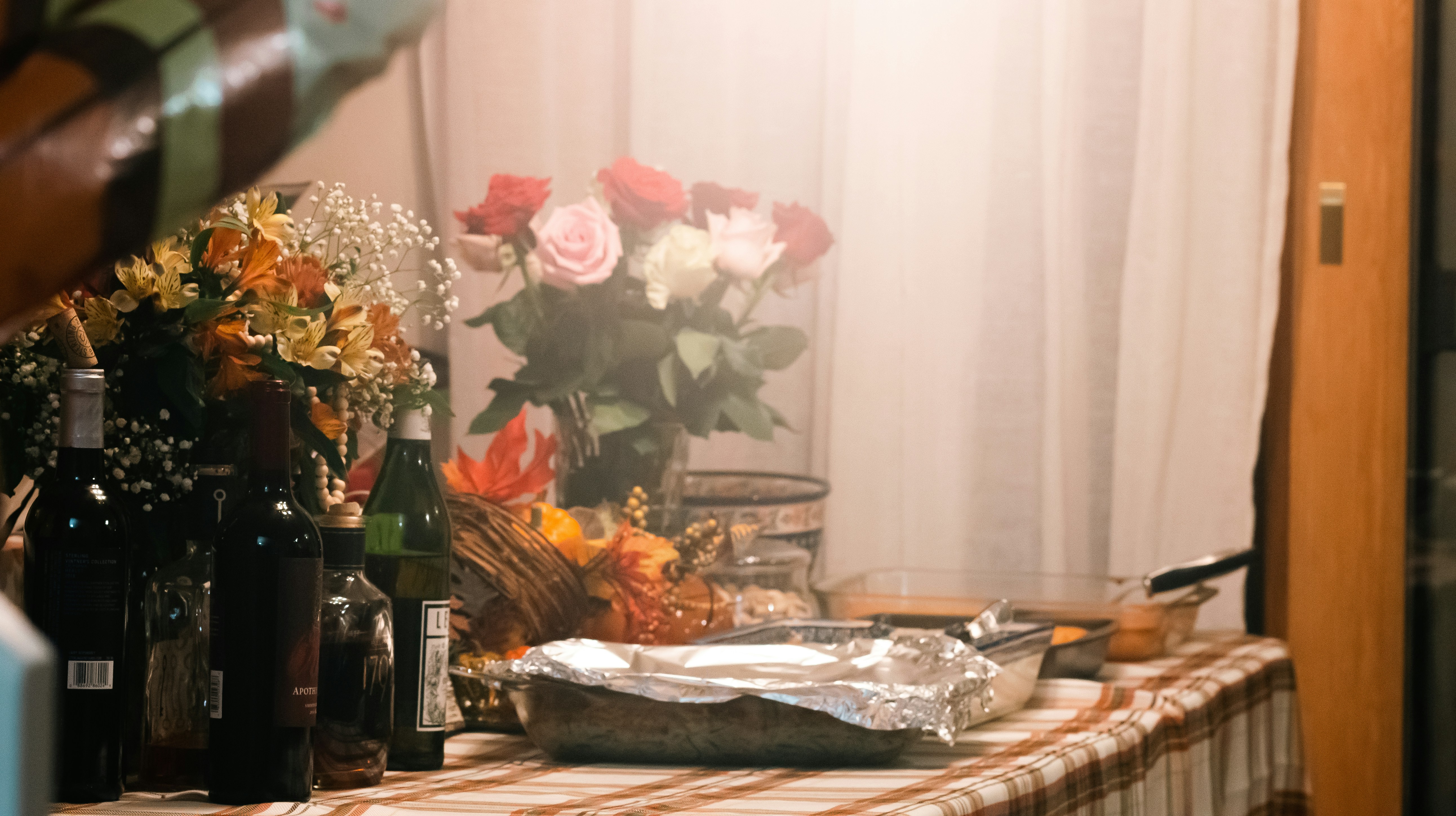 a table with bottles and glasses