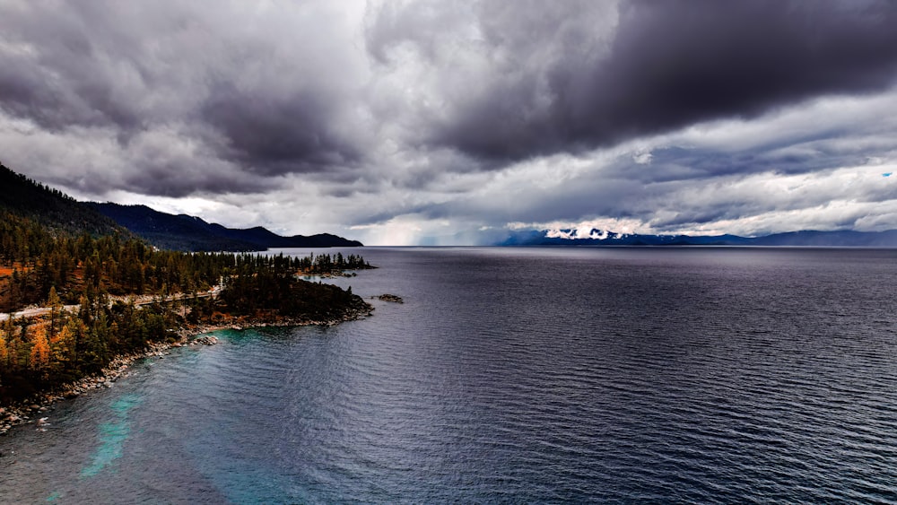 a body of water with land in the back