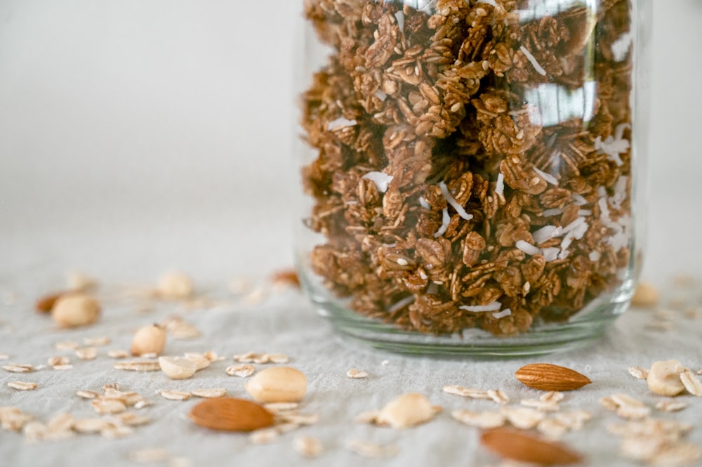 a glass jar with dried leaves