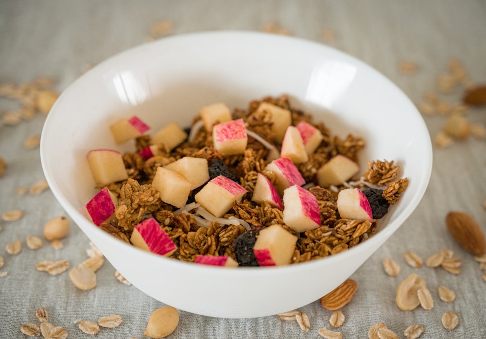 a bowl of cereal with milk and chocolate