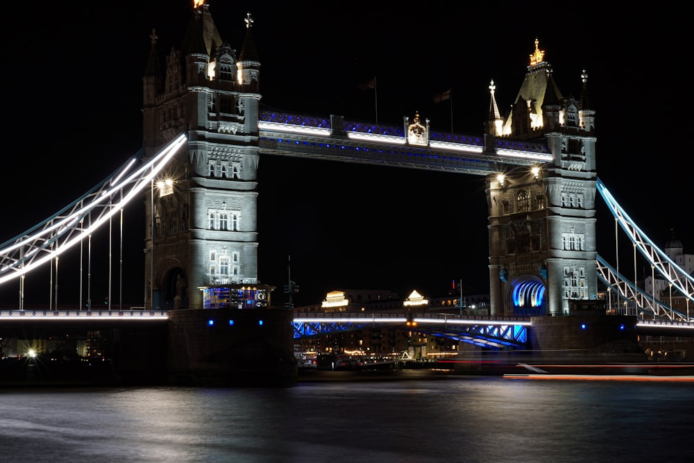 a bridge with towers and lights