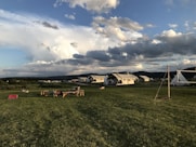 a field with tents in it