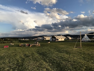 a field with tents in it